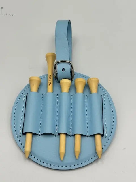 Un tag de sac personnalisable de couleur bleu vue de derrière avec ses tees 