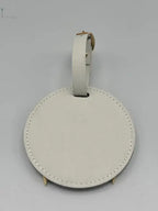Un tag de sac personnalisable de couleur blanche 